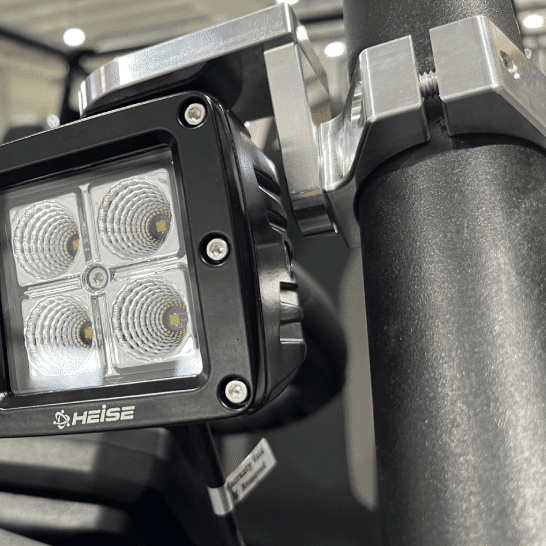Adjustable Light Pod Mounting Clamp by AJK Offroad, studio view