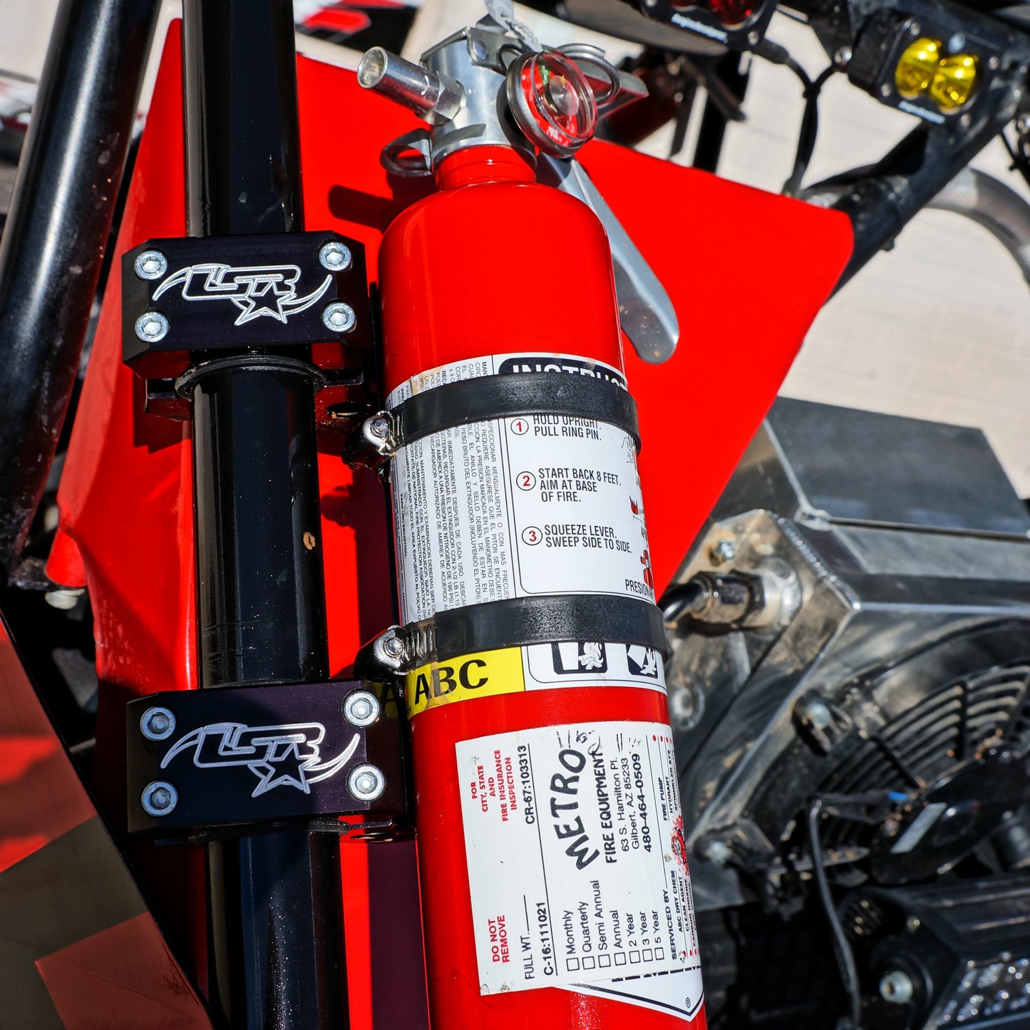 Quick Release Fire Extinguisher Mount UTV Off-Road - Close-Up Detail | Lone Star Racing