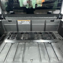 Can-Am Defender HD11 Front Bed Placement Packout Mount by AJK Offroad, close-up detail