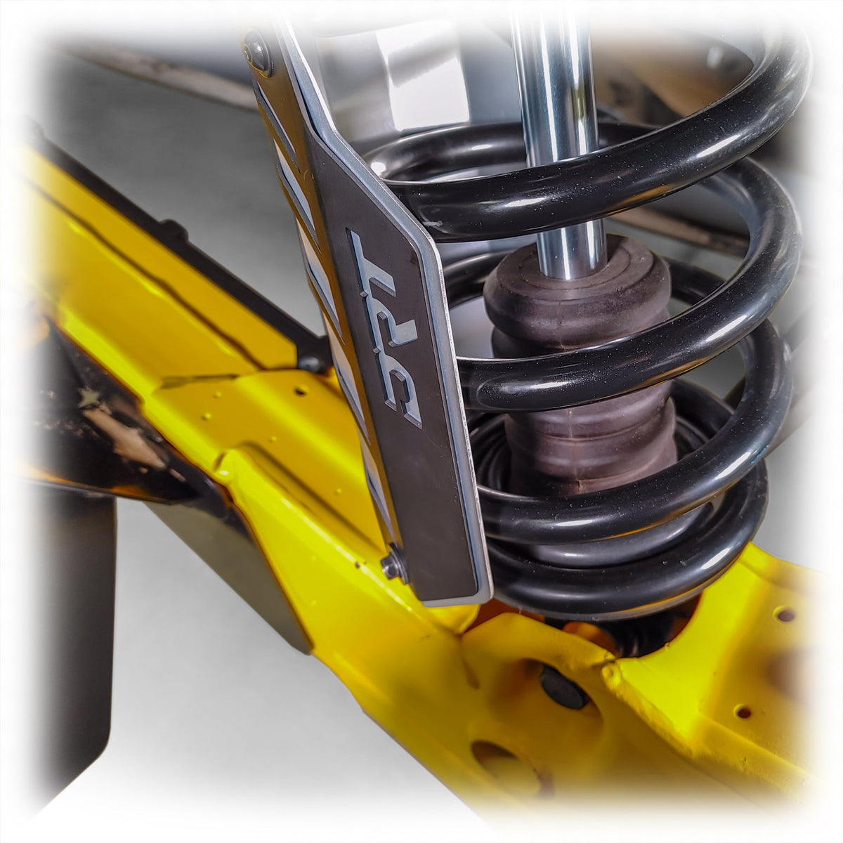 Slip-over rear shock guards kit Can-Am Maverick R / X3, built to protect from rocks and sand