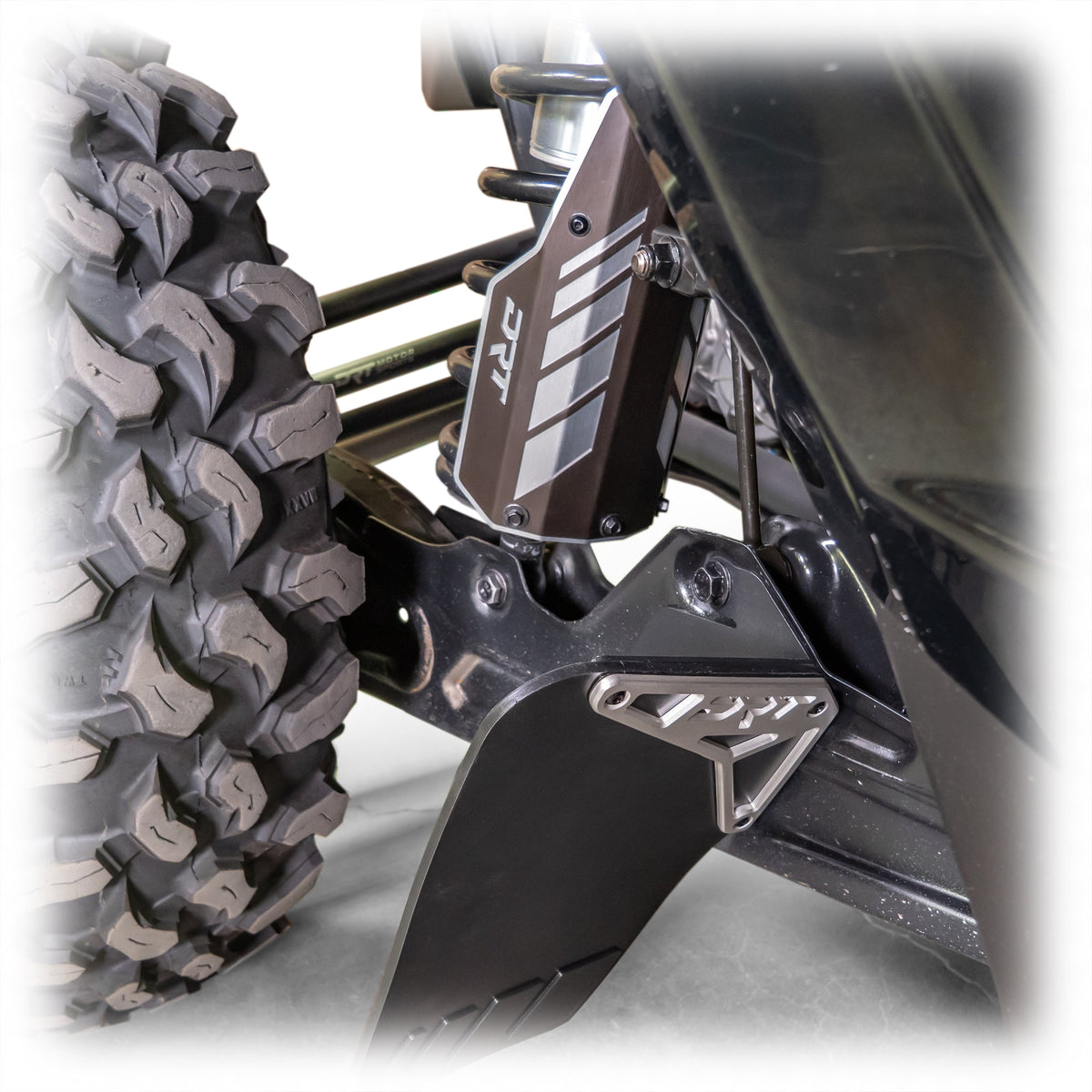Durable rear shock guard set for Can-Am Maverick R 2024+ (also X3), black anodized finish, debris shield