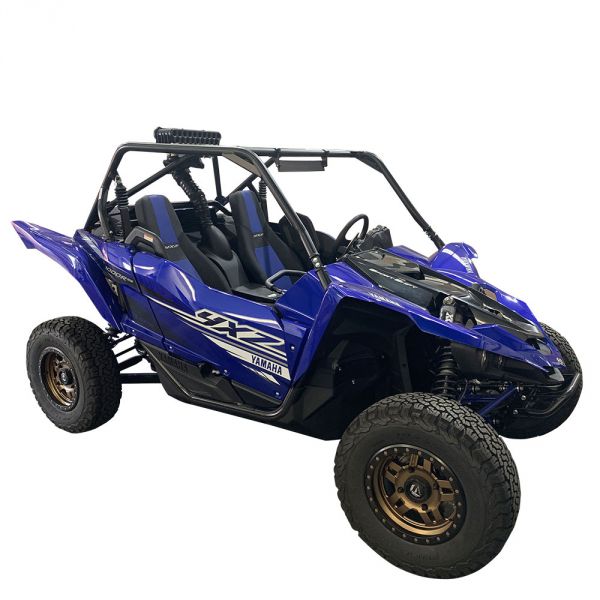 PARTICLE SEPARATOR FOR 2019-20 YAMAHA YXZ 1000R installed on a blue Yamaha side-by-side UTV, showcasing off-road capabilities.