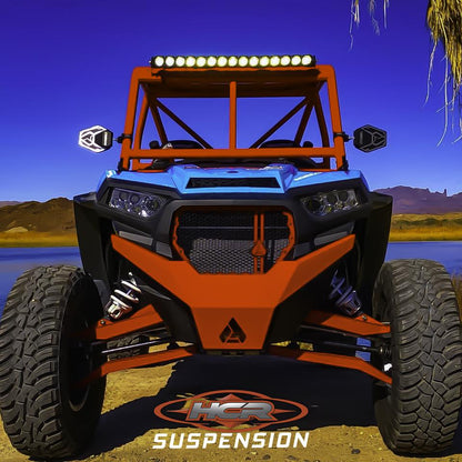 HCR Racing RZR-05300-1 Polaris RZR XP 1000 Dual Sport Front A-arms on a UTV with rugged terrain and bright LED light bar.